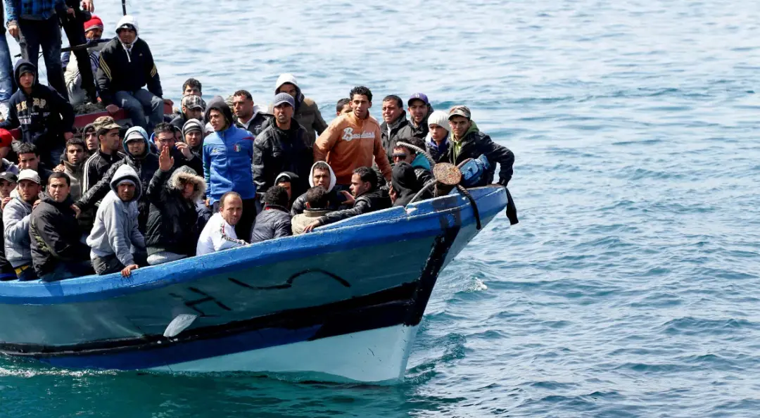 migranci